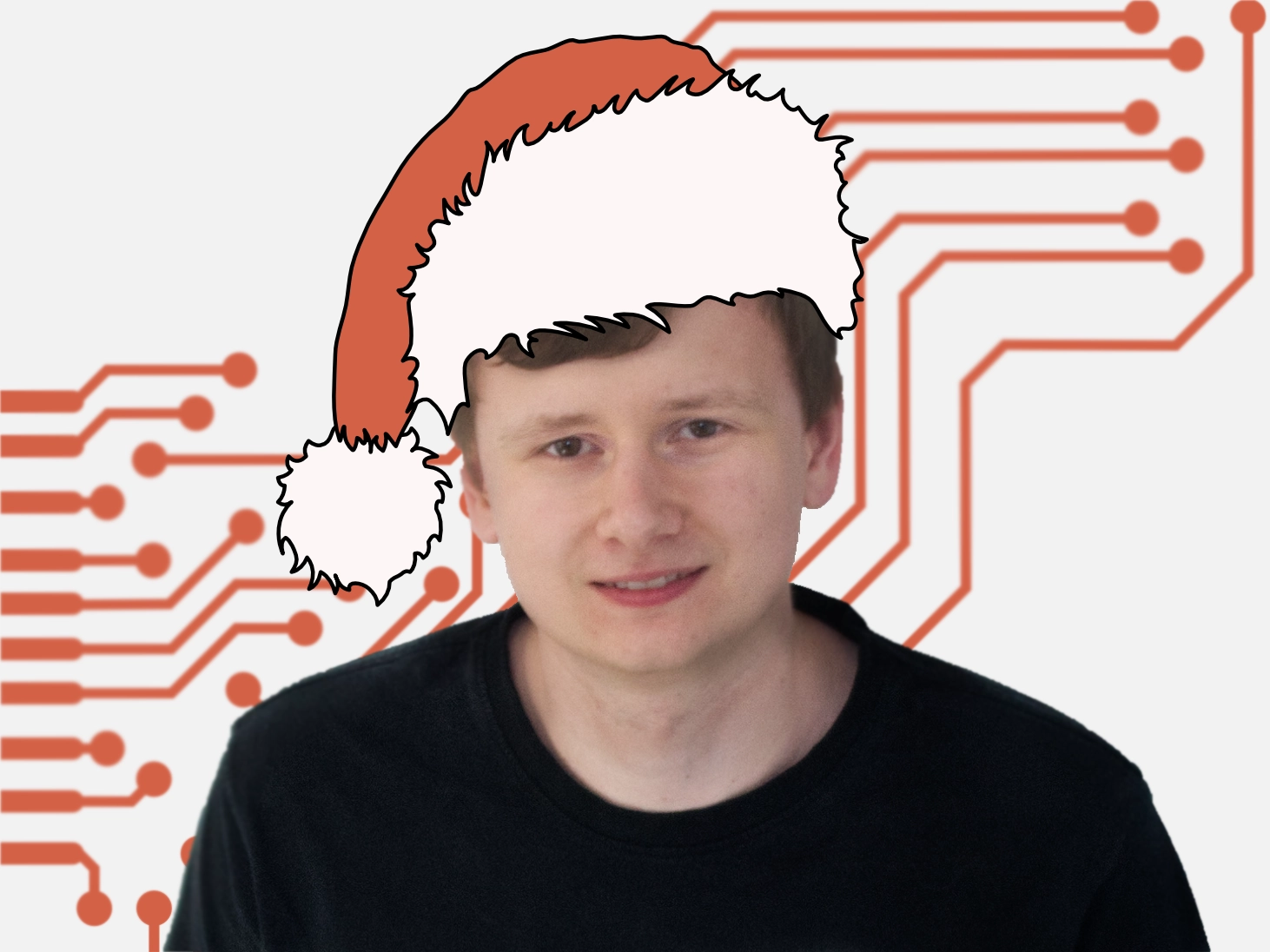 dunkelhaariger Mann, lächelnd, schwarzes T-Shirt